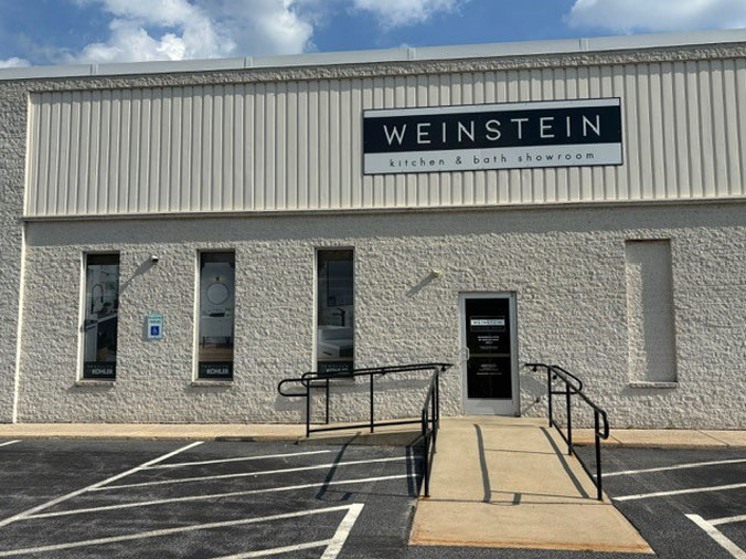 Weinstein Reading building exterior, front door and sign